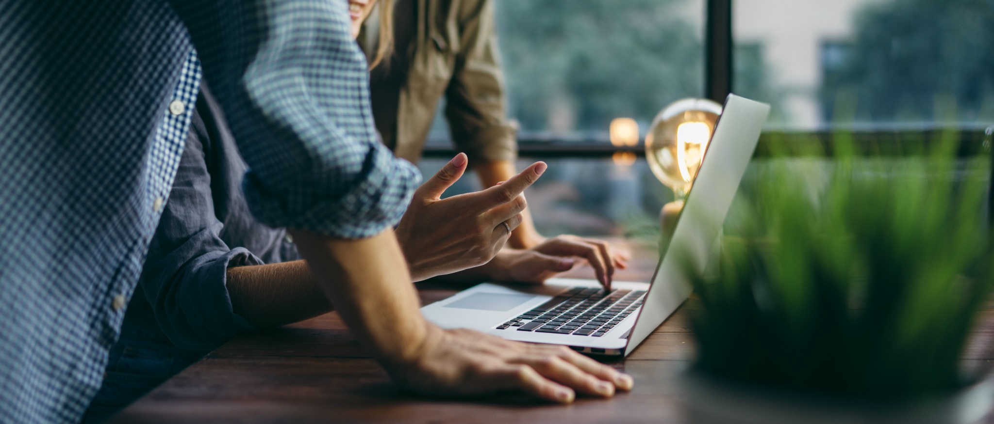 Meeting around a laptop