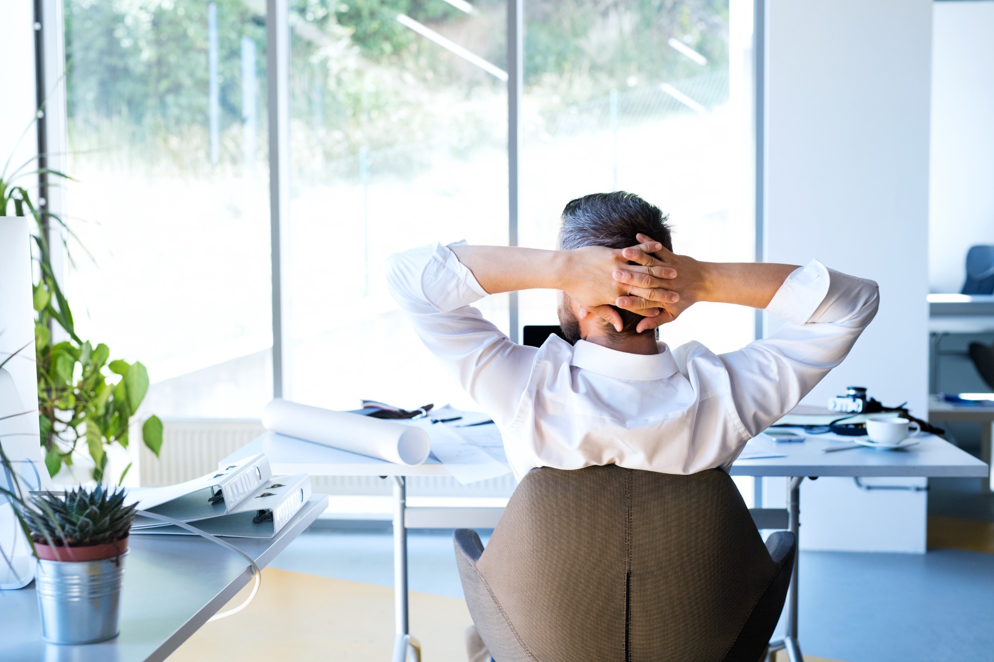 Owner builder planning documents on a desk